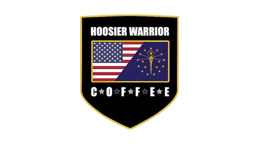 White lettering on black logo with blue, red, white, and yellow flag.