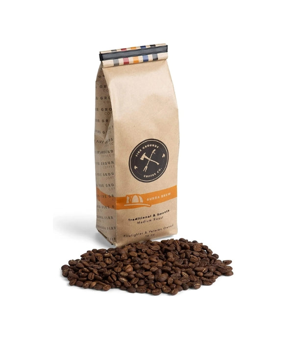 Tan bag with black circle logo and orange stripe next to small pile of coffee beans with white background. 