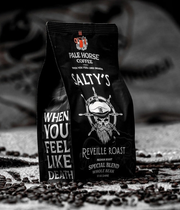 Black bag of coffee with a white skeleton head over a white helm, and white lettering with a gray background. 